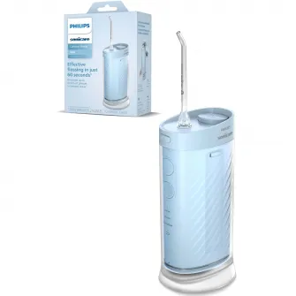 Dus bucal Philips Sonicare Seria 1000 HX3333/24, compact si portabil, rezervor pliabil de 200 ml, 3 moduri de curatare, contine 2 capete de curatare (1 capat Standard N1, 1 capat Confort N2 ), albastru