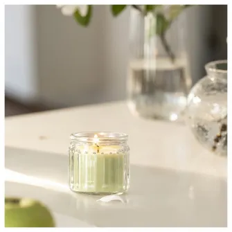 IKEA LÖVSKOGSLUND Lumanare parfumata pahar, mar/verde deschis, 12 h