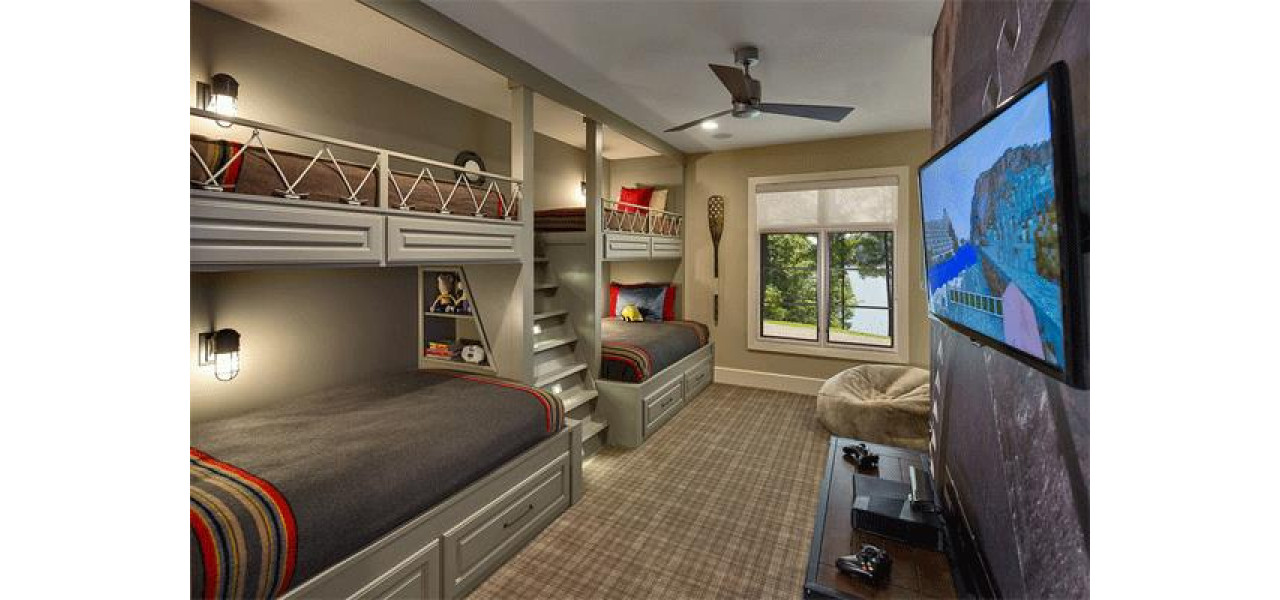 Gasirea de paturi pentru doua persoane cu spatiu incorporat pentru un sistem home theater.