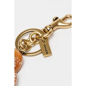 COACH, Breloc cu talisman covrig, Alb, Auriu, Bronz