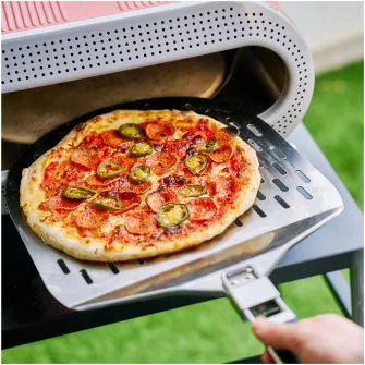 Cuptor electric pentru pizza Tefal Pizza Pronto JM600TE0, 2600 W, 4 trepte de temperatura, piatra rotativa automata, paleta pentru pizza, maro & argintiu
